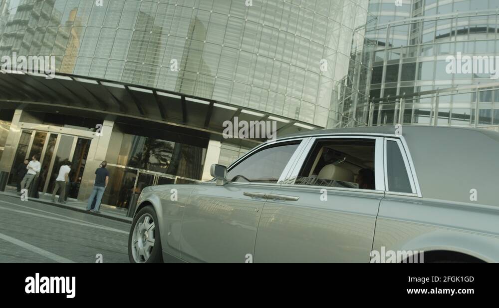 Car Pulling Up to the Burj Khalifa Stock Video Footage Alamy