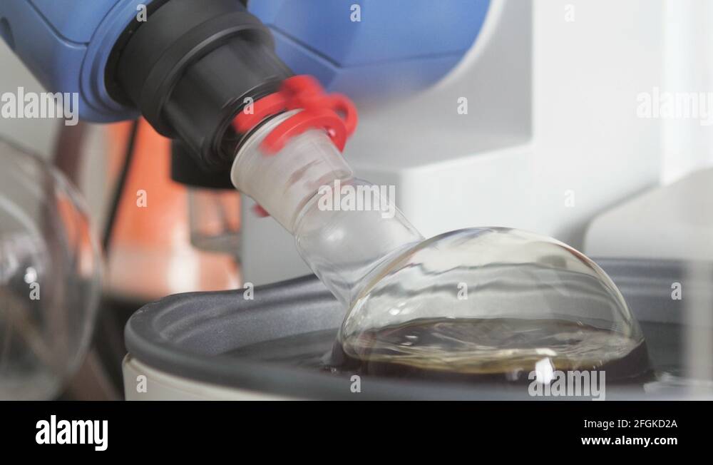 Chemical Laboratory. A test tube with a liquid. The bulb is spinning in