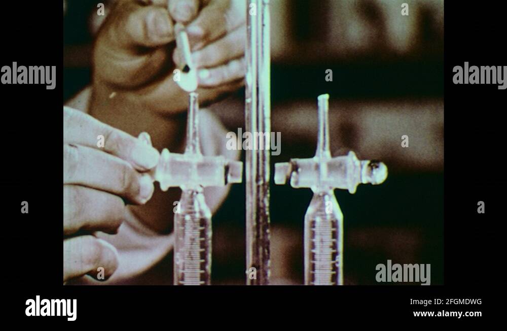 1960s hands hold flame above a tube and turns tap, flame flickers