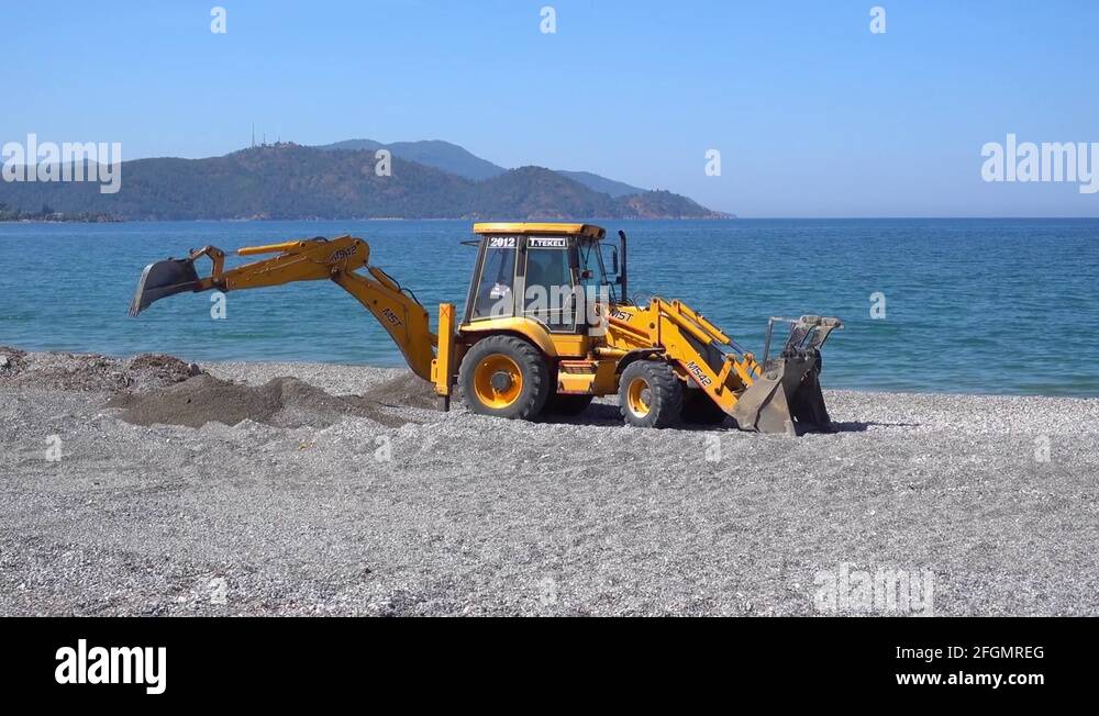 Excavator on beach Stock Videos & Footage - HD and 4K Video Clips - Alamy