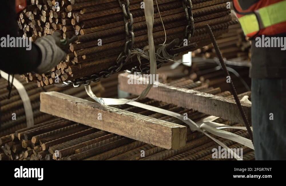 Placing A Bundle Of Steel Bars In Warehouse Stock Video Footage Alamy