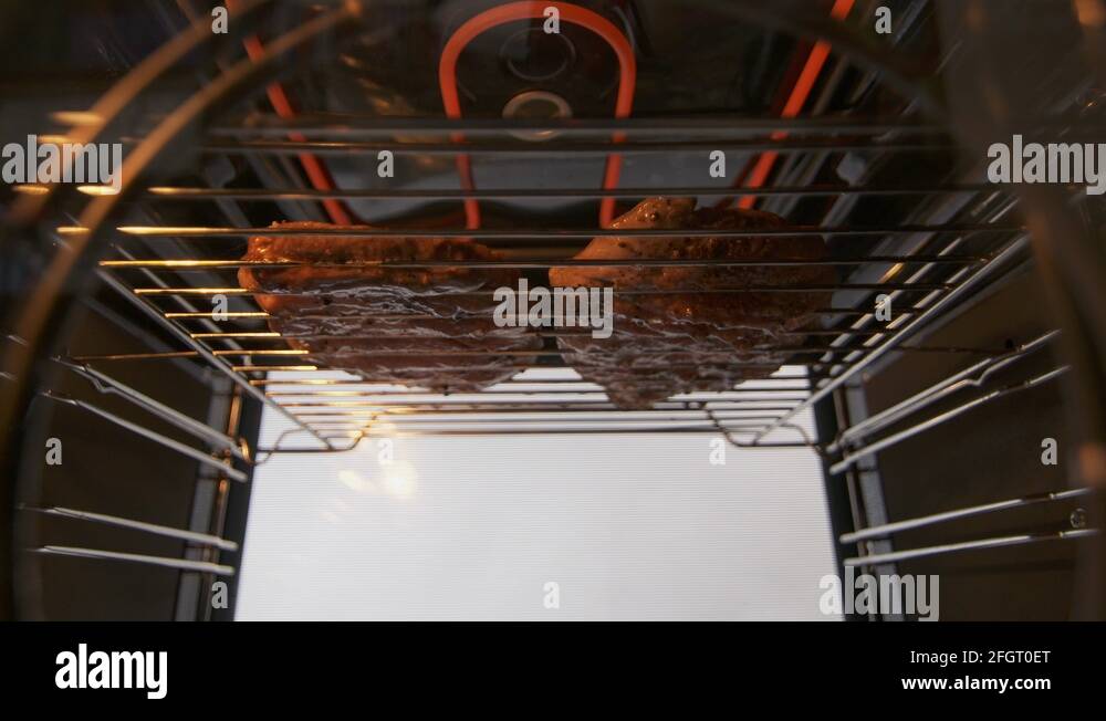 Cooking grilled steak ribeye in the oven with broiler. Grill element