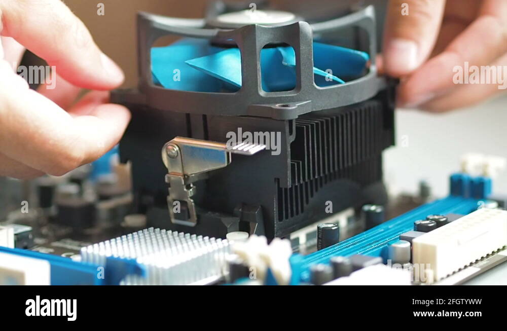 Removing And replacing Fan CPU on the motherboard. Installing and ...