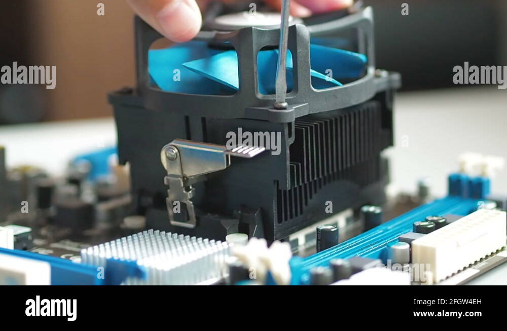 Removing And replacing Fan CPU on the motherboard. Installing and ...
