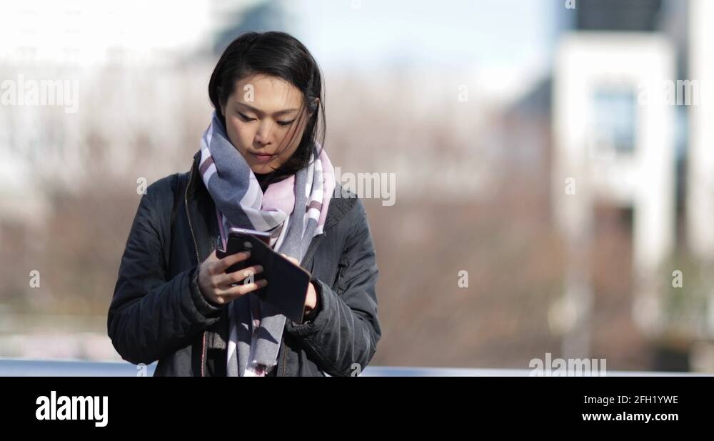 Adults in japan using smart phone Stock Videos & Footage - HD and 4K