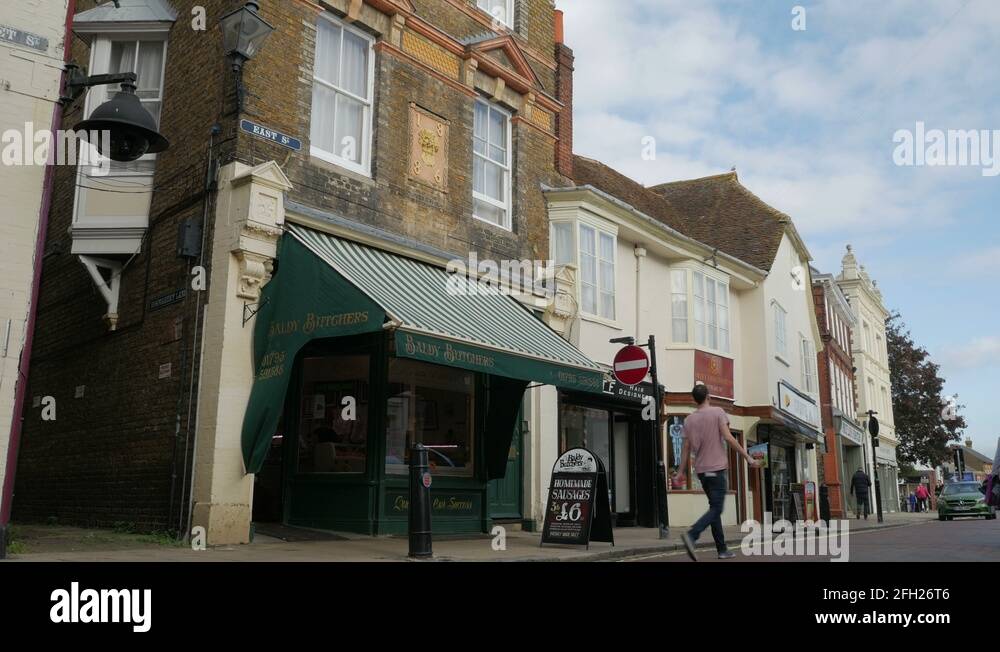 Shoppers and Visitors walking the pedestrianised shopping area of