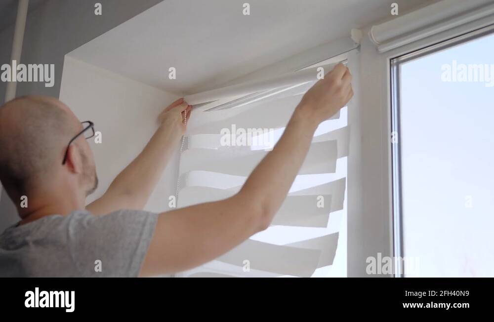 Installing blinds Stock Videos & Footage HD and 4K Video Clips Alamy