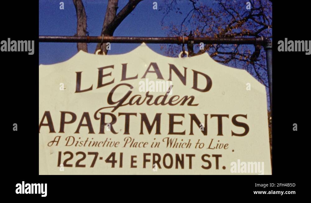 1950's Sign reads "Leland Garden Apartments; large brick apartment