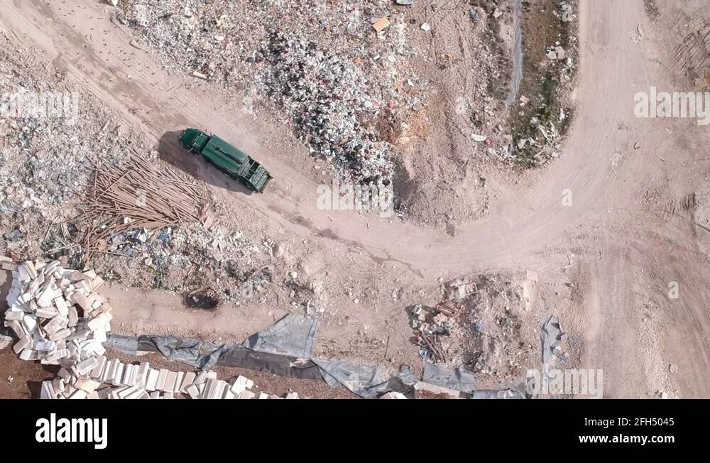 Garbage Truck At Freeport Landfill Dump Yard, Freeport, Bahamas Stock