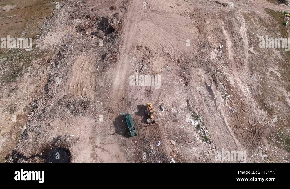 Garbage Truck Off Loading At Freeport Landfill Dump Yard, Freeport, Bahamas Stock Video Footage