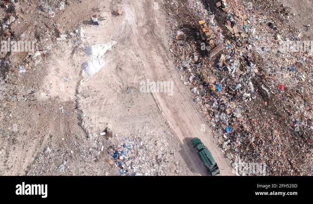 Garbage Truck At Freeport Landfill Dump Yard, Freeport, Bahamas Stock
