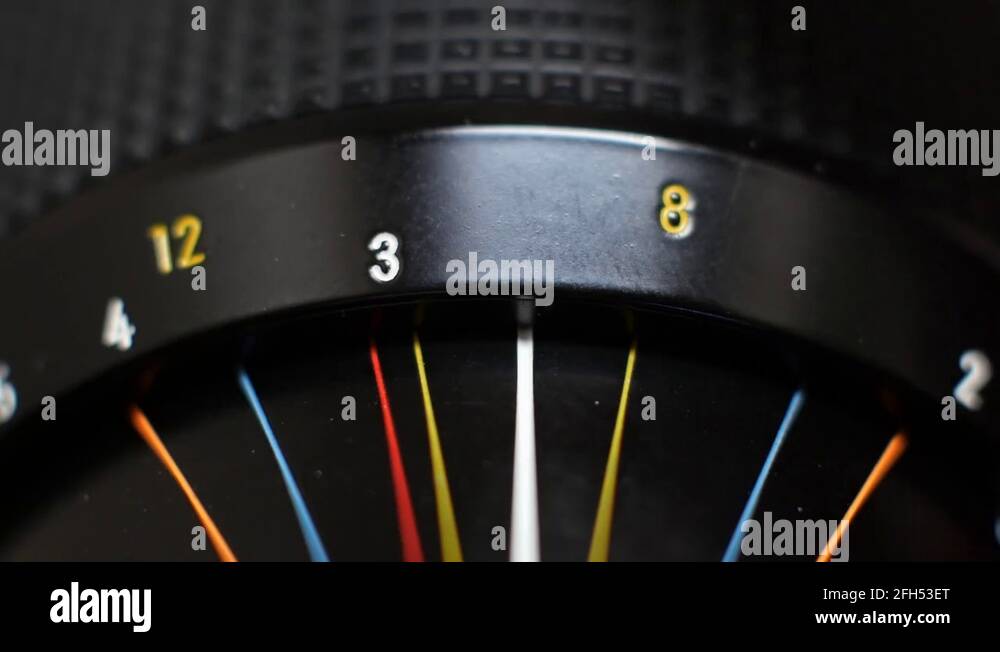 Extreme close up focusing a large vintage camera lens Stock Video