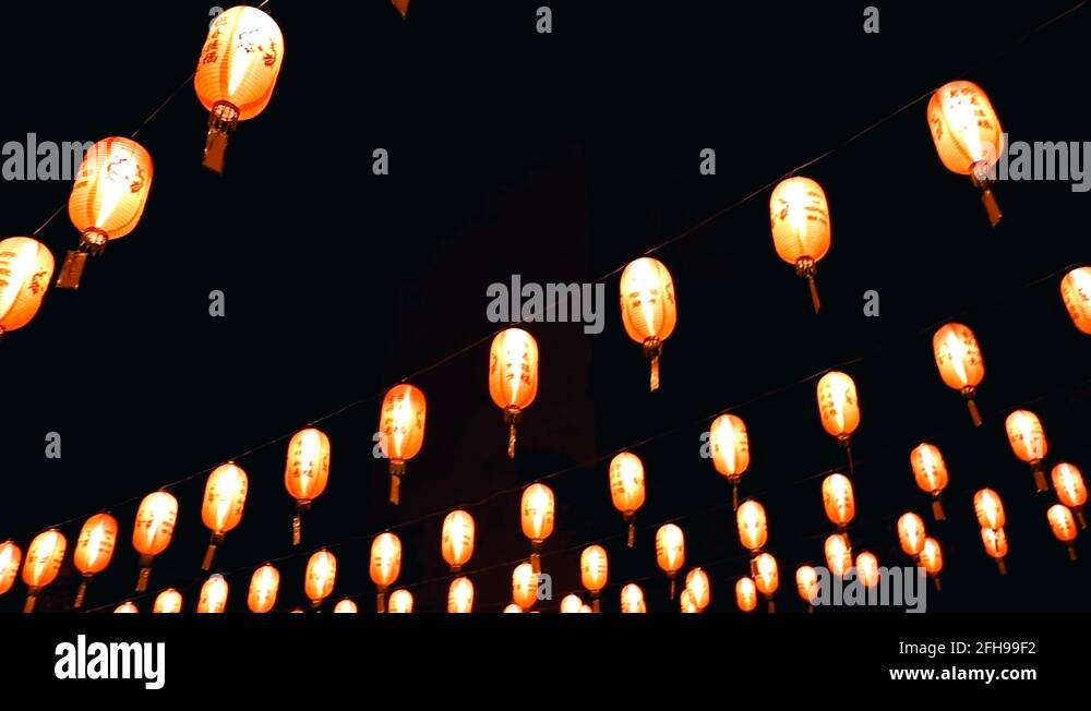 Chinese lanterns in the Asian Temple. Colourful festoons, New Year Stock Video Footage Alamy