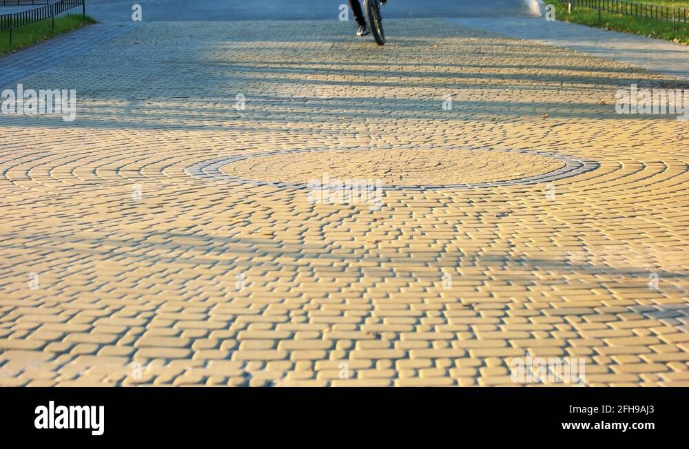 riding bike on pavement
