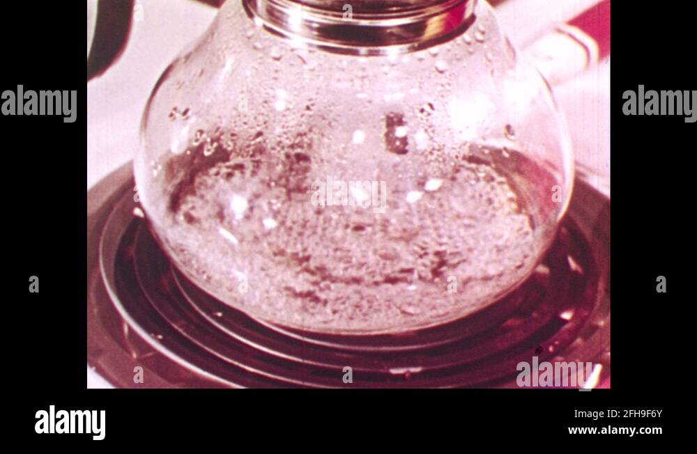 Water boiling in glass container Stock Videos & Footage HD and 4K