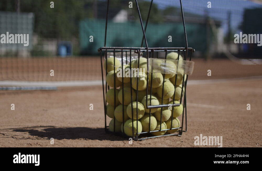 Bucket full of tennis balls Stock Videos & Footage HD and 4K Video