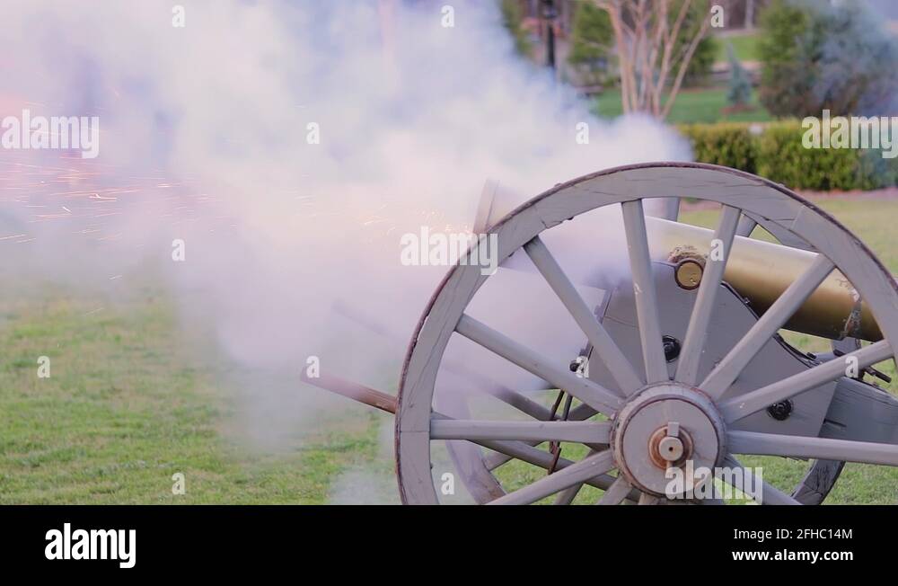 Footage of a rustic cannon firing. Footage is in slow motion Stock