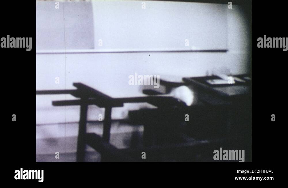 1960s: UNITED STATES: rat in laboratory experiment. Rat traverses maze