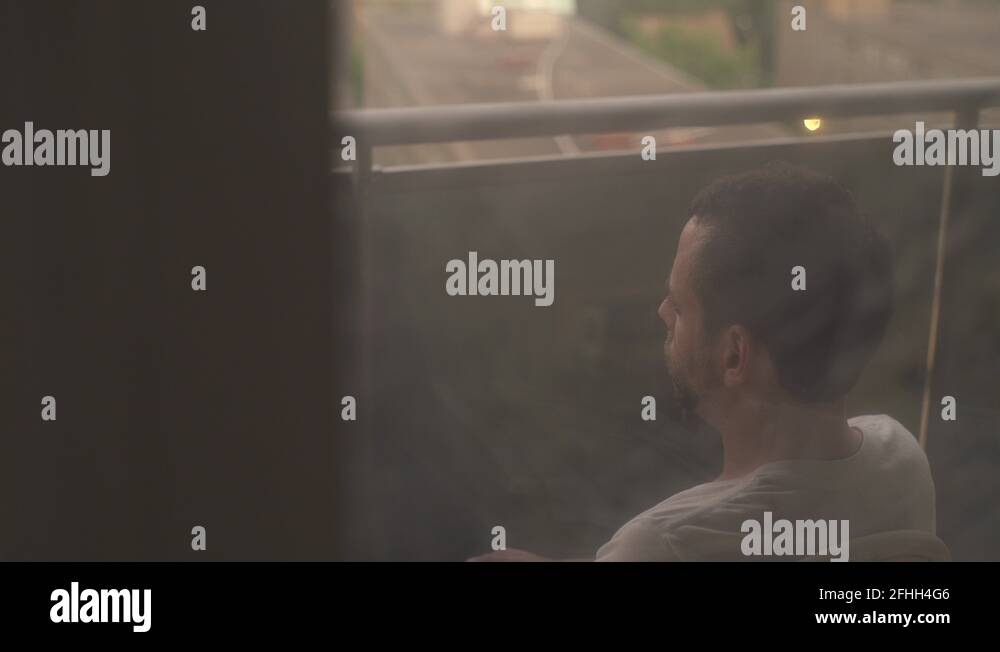 Smoking man on balcony Stock Videos & Footage HD and 4K Video Clips