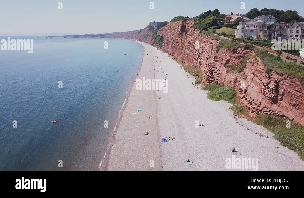 An Aerial View Of The Beautiful Pebble Beaches Of Budleigh Salterton A Small Stock Video