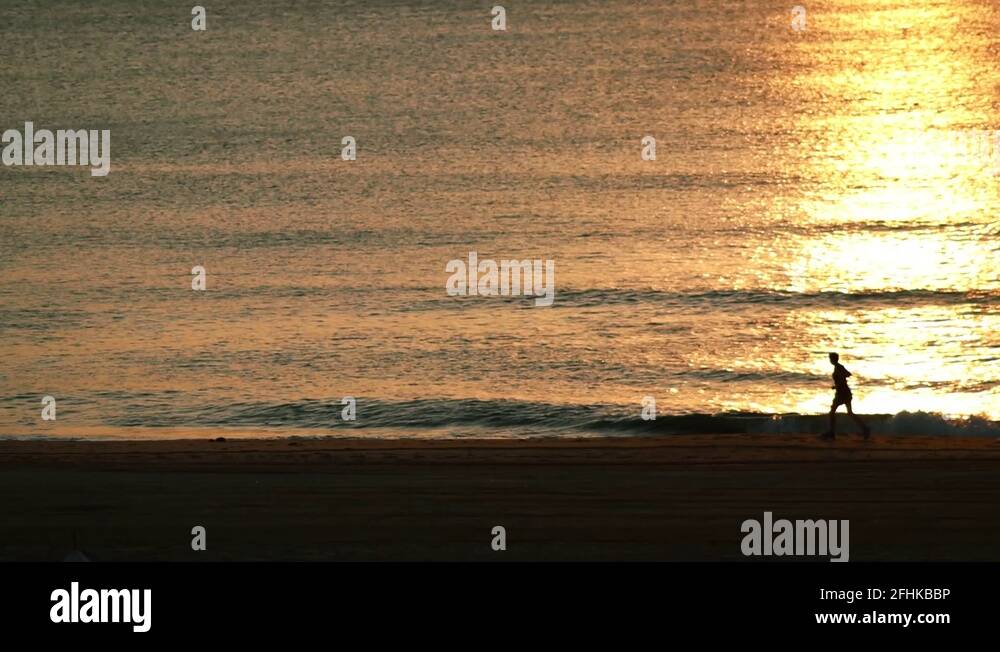 Running sun beach Stock Videos & Footage - HD and 4K Video Clips - Alamy