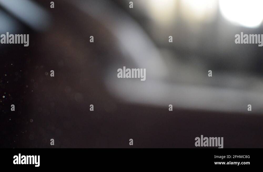 A short clip of dust floating round a room giving a nice effect Stock ...