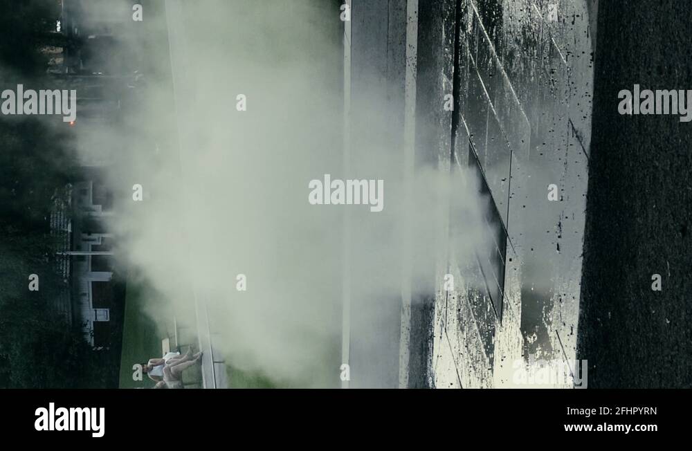Steam Rising Up Out Of A City Street Drainage Grate. Vertical Stock ...
