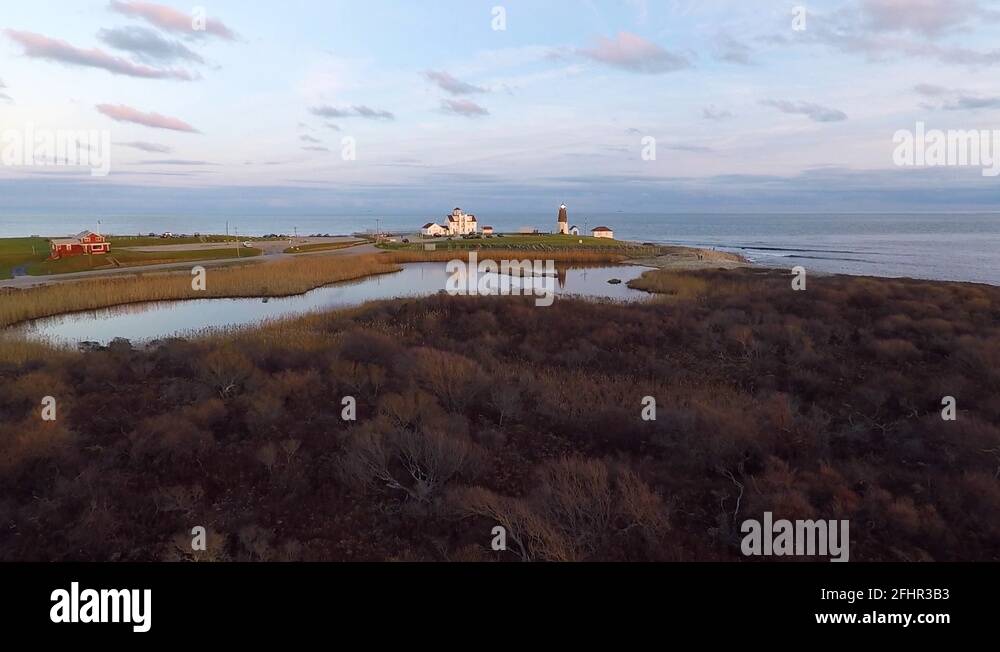 Sunset at Point Judith Lighthouse in Narragansett Stock Video Footage