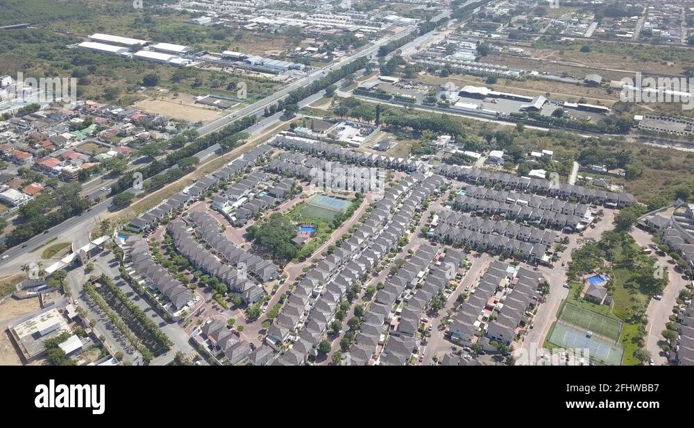 An aerial view of houses of a gated community un Guayaquil, Ecuador