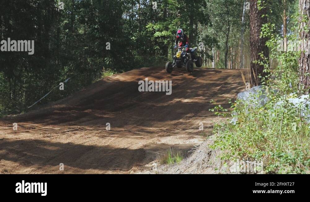Quad jump and closeup Stock Video Footage Alamy