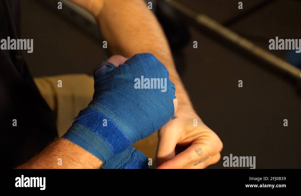 Finishing wrapping wrist for martial arts Stock Video Footage Alamy