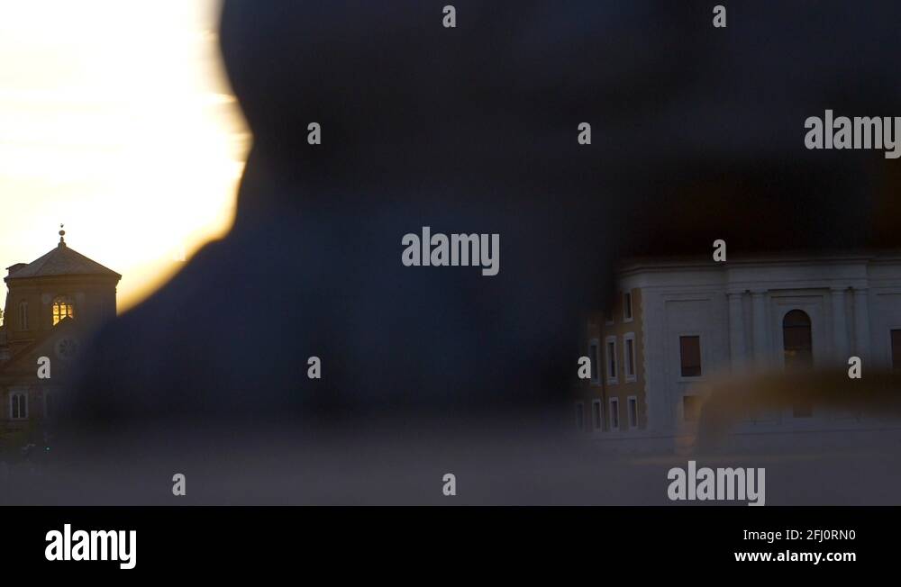 LENS FLARE: Bright golden sun rays shine past the historic cathedral in ...