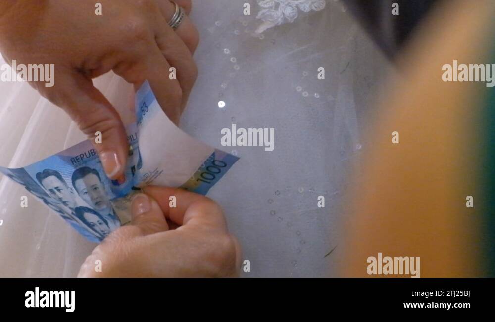 Wedding tradition in Philippines, giving money Stock Video Footage Alamy