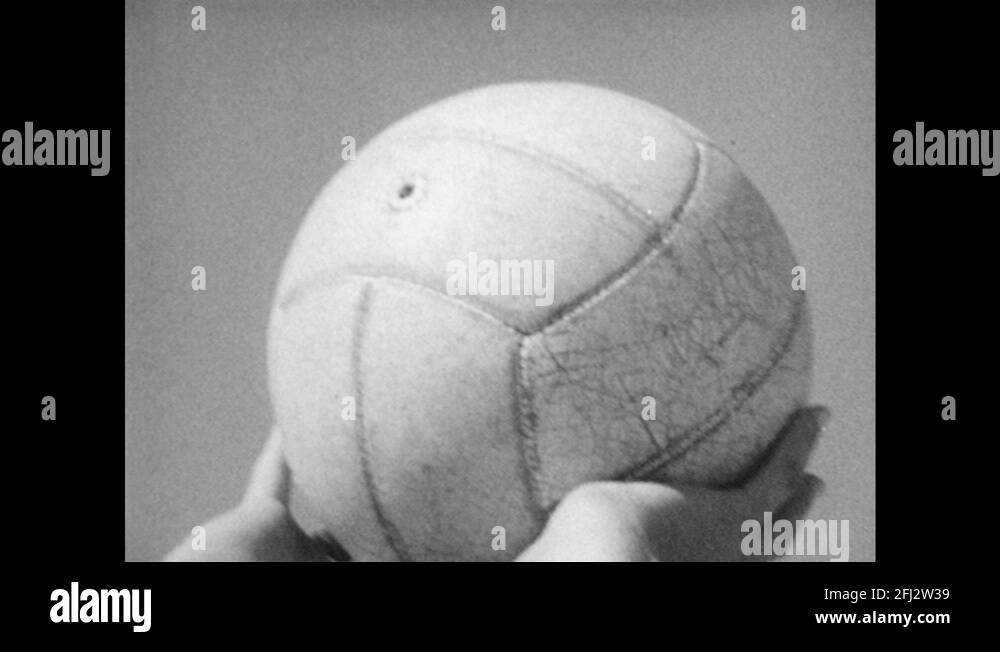 1960s Hands toss volleyball. Xray of joints in hand and wrist Stock