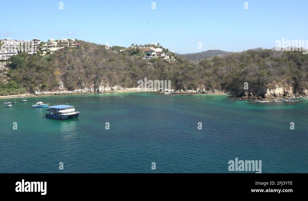 Mexico Huatulco boats and houses on hills Stock Video Footage Alamy