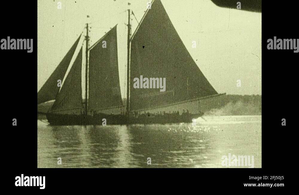 1930s Title screen. Sail boat races through water. Sailor turns wheel