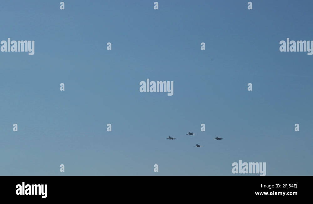 Military fighters makes a maneuver in the sky Stock Video Footage - Alamy