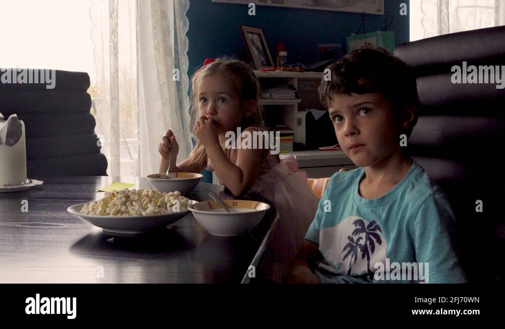 Family watching tv eating dinner Stock Videos & Footage HD and 4K