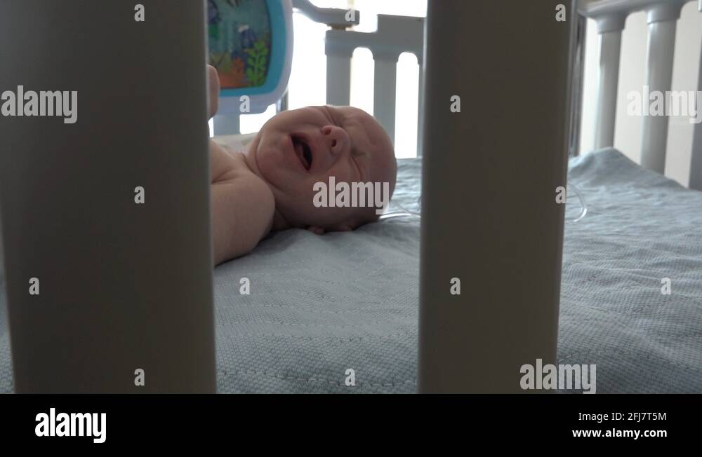 Sick baby crying in crib Stock Videos & Footage HD and 4K Video Clips