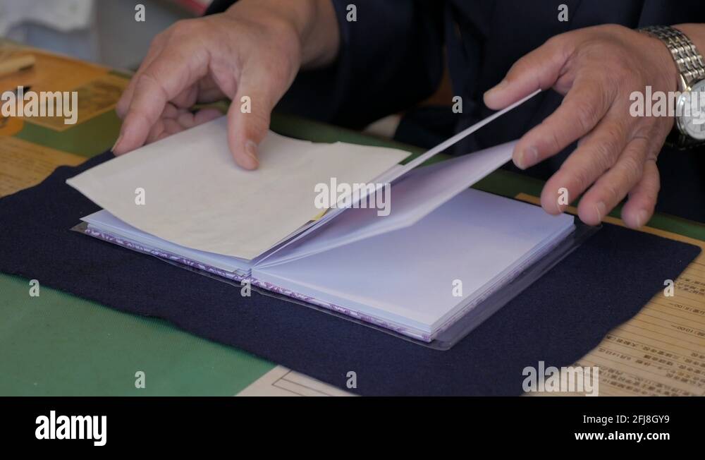 Japan Temple Stamp Book made by a monk in a japanese temple Stock Video