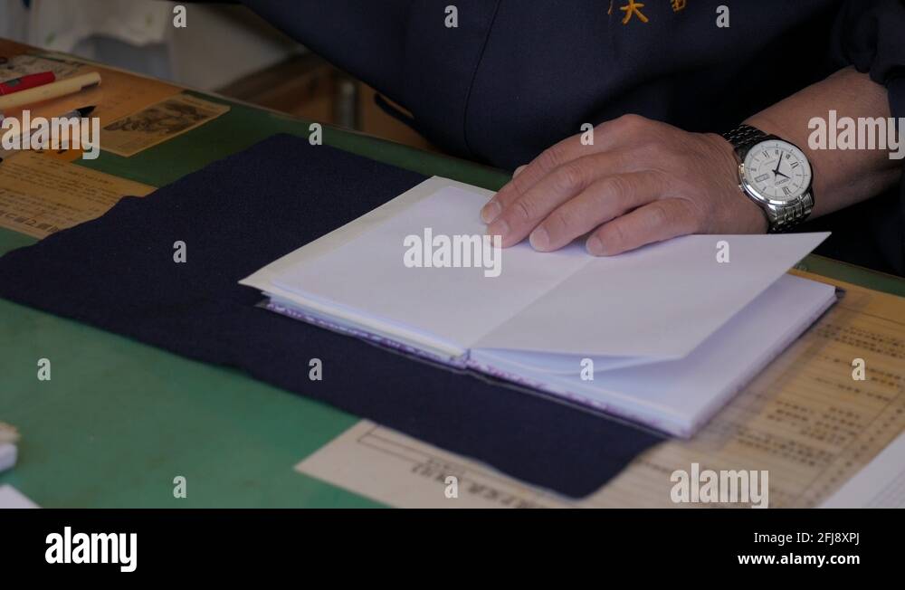 Japan Temple Stamp Book made by a monk in a japanese temple Stock Video