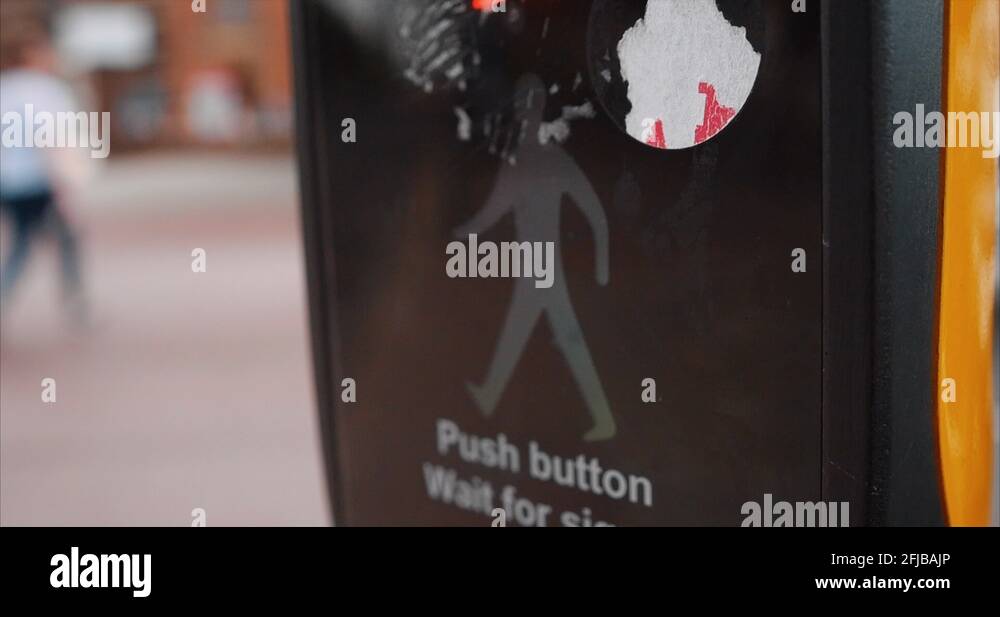 A pedestrian traffic light changing from green to red. Go to stop Stock
