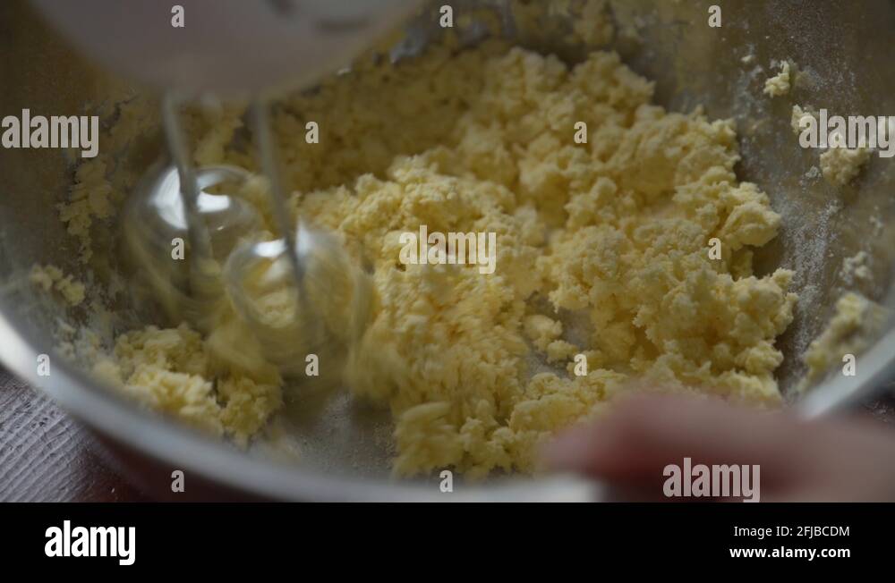 Mixing butter and flour with the blender Stock Video Footage Alamy