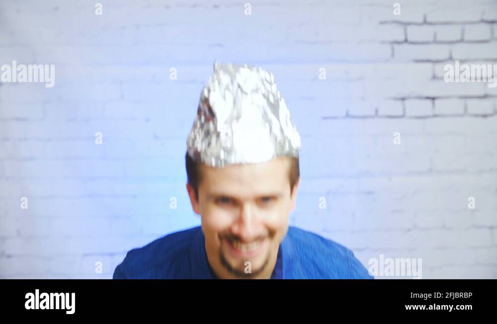 The tinfoil hat person mocking the stereotypes meme 4K Stock Video Footage Alamy
