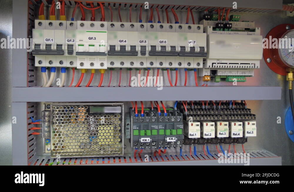 Electrical panel with multiple switches, wires, short circuit