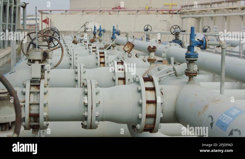 Large crude oil storage tanks in a huge refinery Stock Video Footage