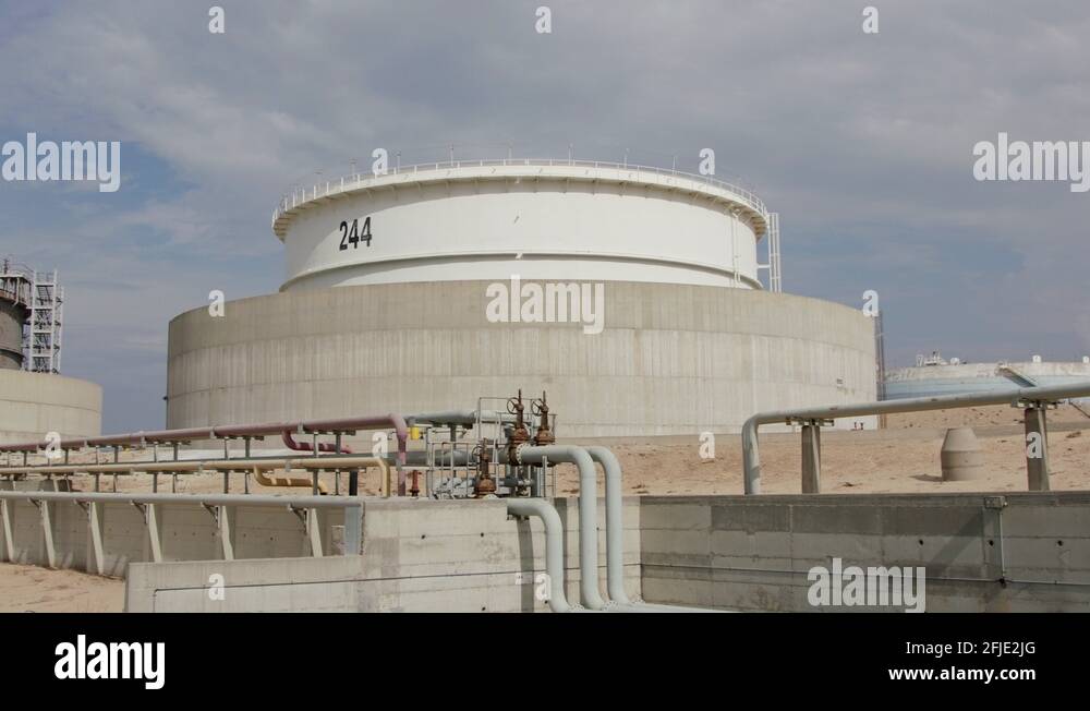 Large crude oil storage tanks in a huge refinery Stock Video Footage