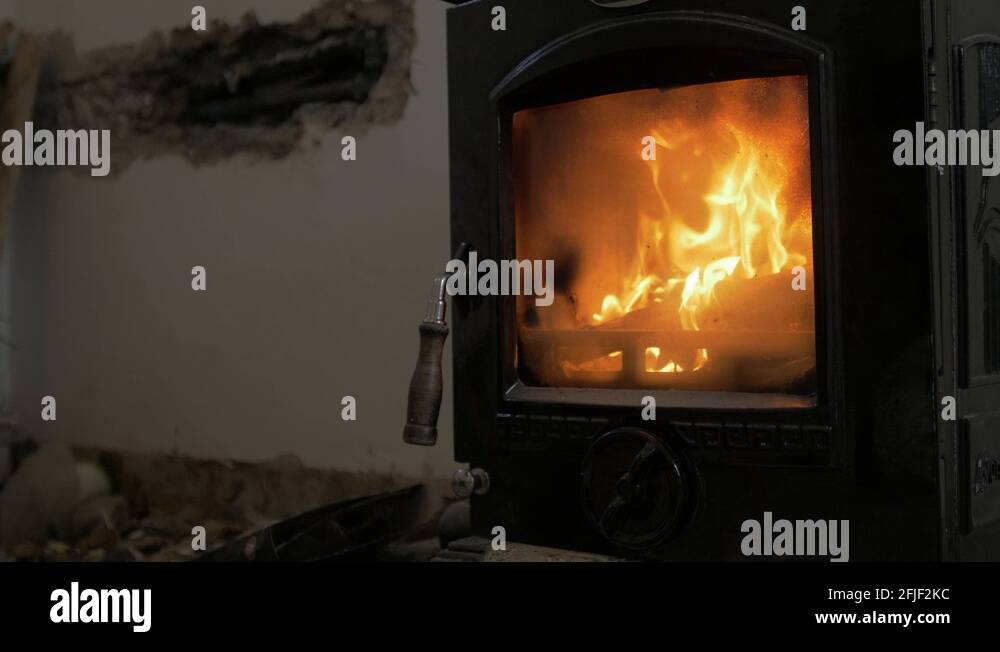Lovely stove slow motion fire and flames renovating house Stock Video
