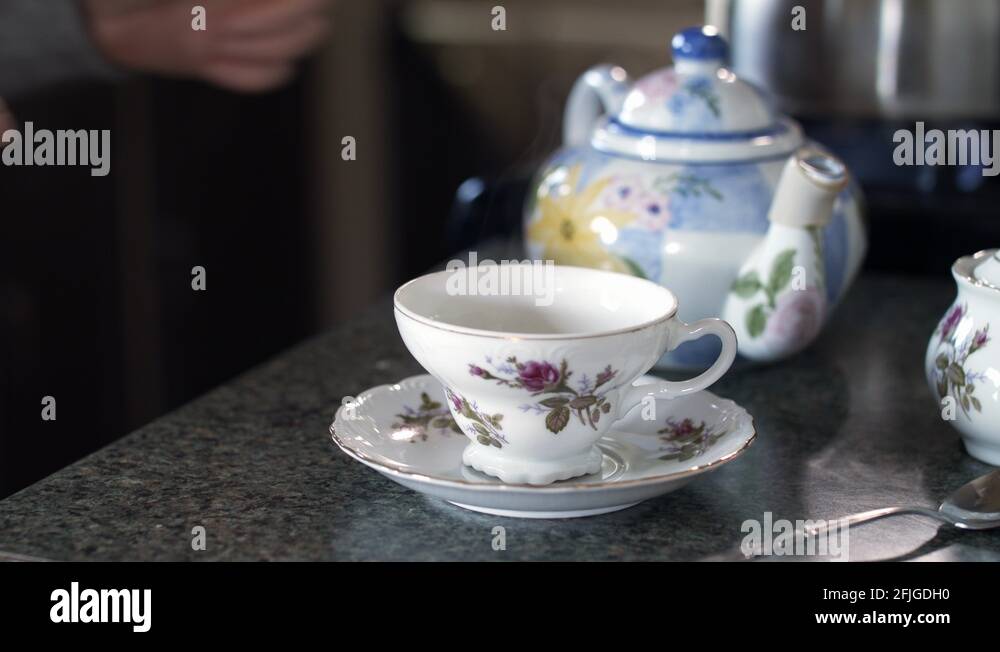 Pouring tea from a china teapot Stock Videos & Footage HD and 4K