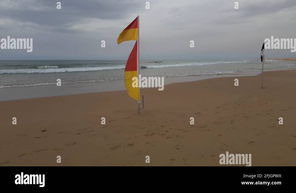 Surf life saving flags at beach Stock Video Footage Alamy